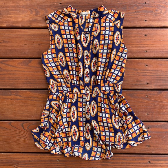 hazel Tops - Bold pattern sleeveless shirt with loose peplum